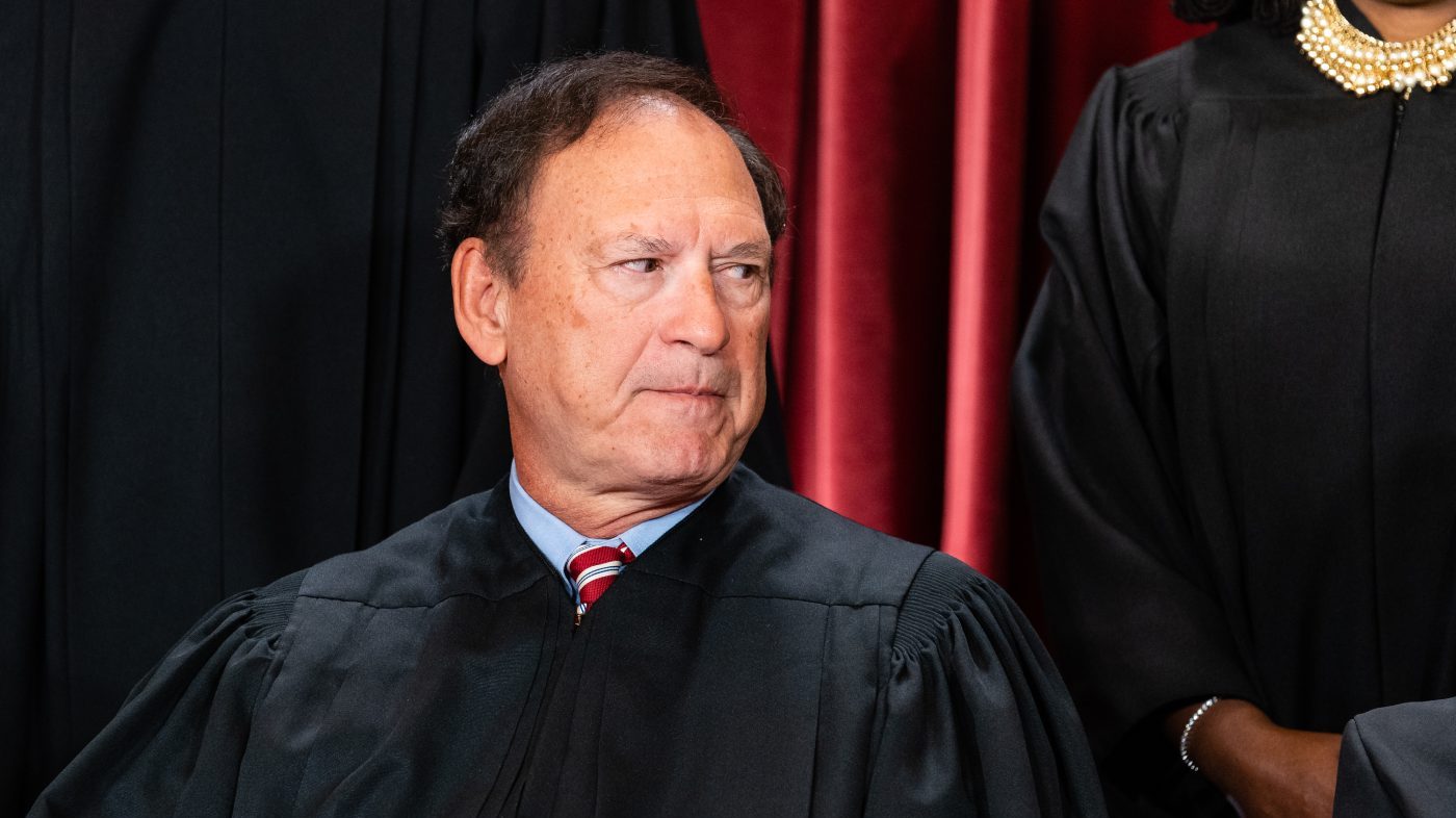 Alito Confirms He'll Stay for Another Term as Court Takes Up Gun Bans