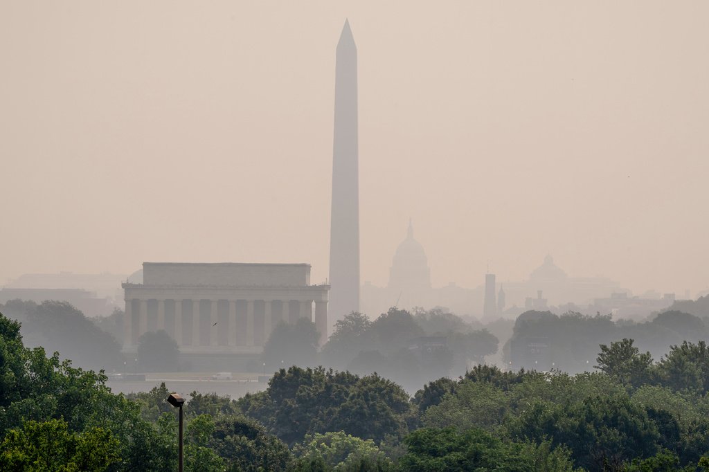 Canadian Wildfire Smoke Lingers Over U.S. as Weekend Storms Offer Relief