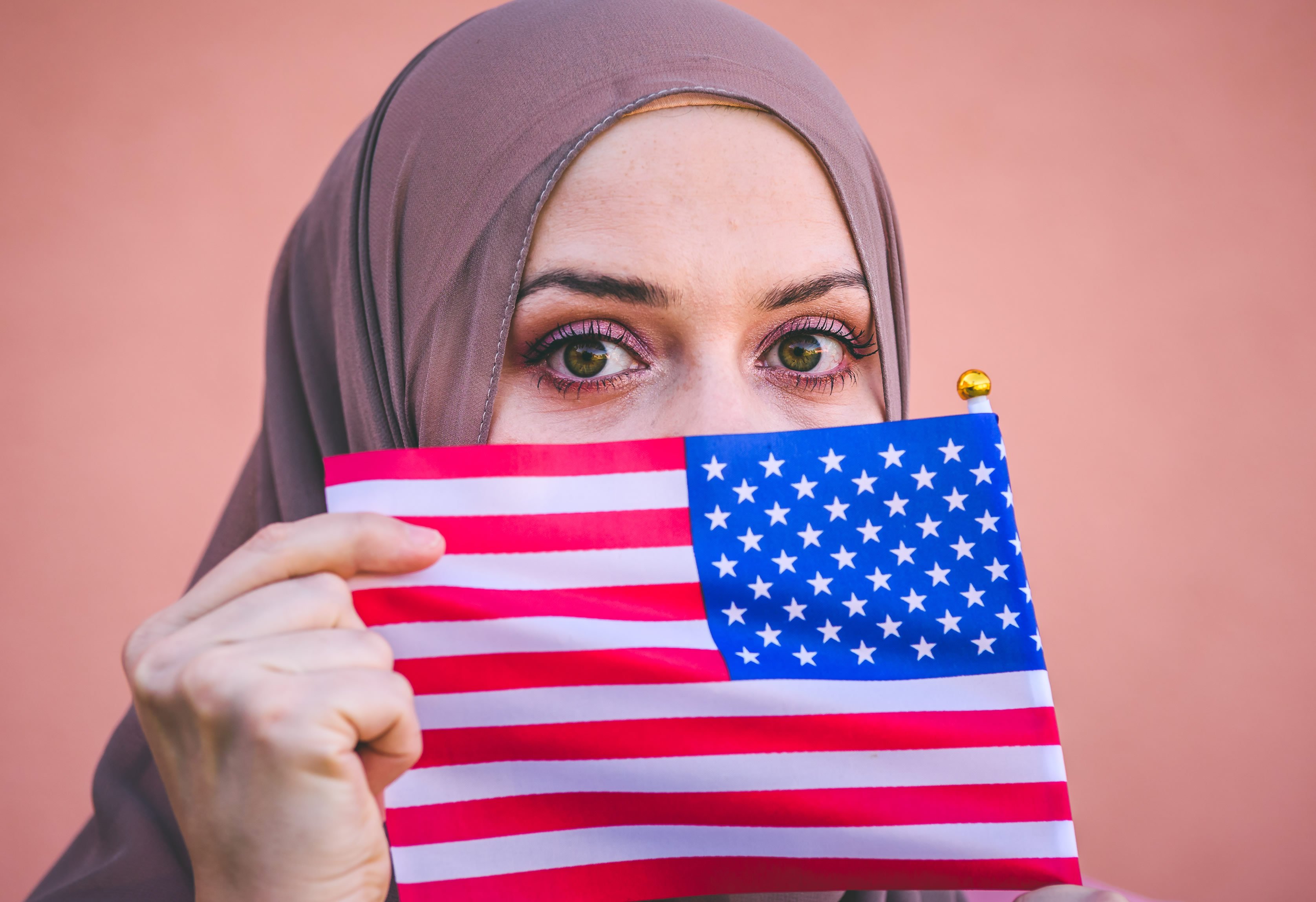 Muslim Americans: Patriotic, Divided, and Reshaping Their Political Identity