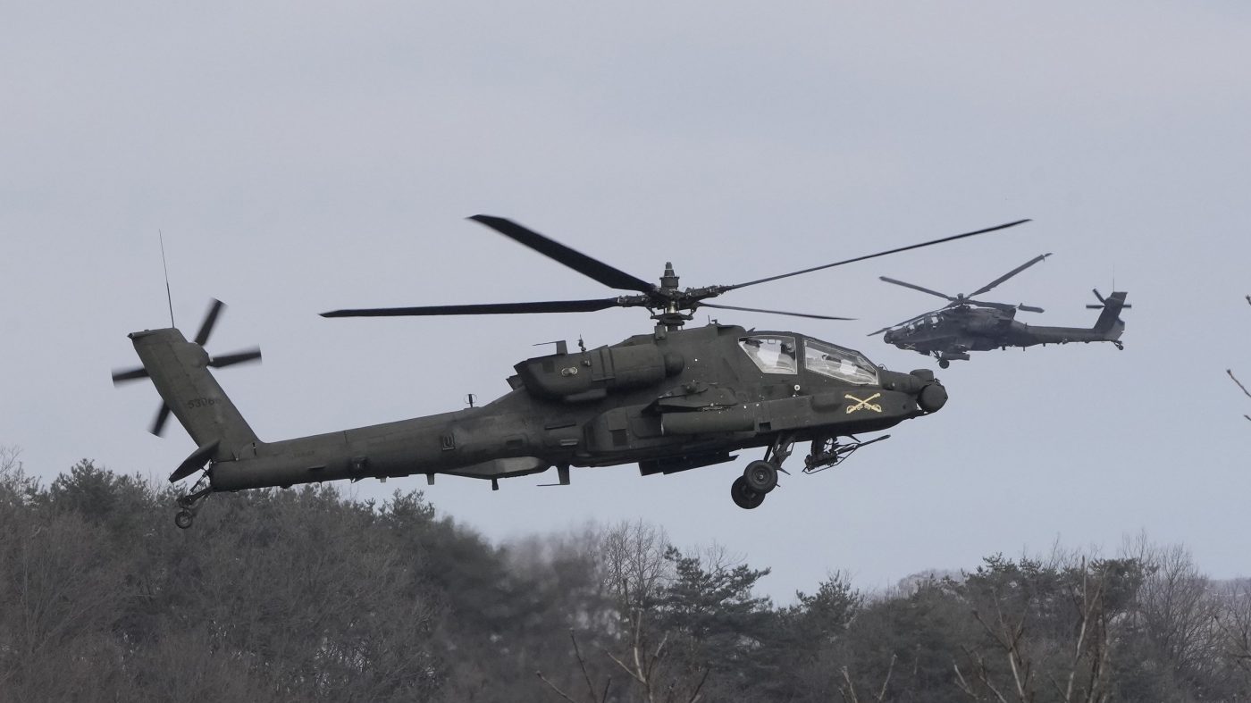 South Carolina Apache Pilots Reinstated After Political Backlash Over Beach Flyover